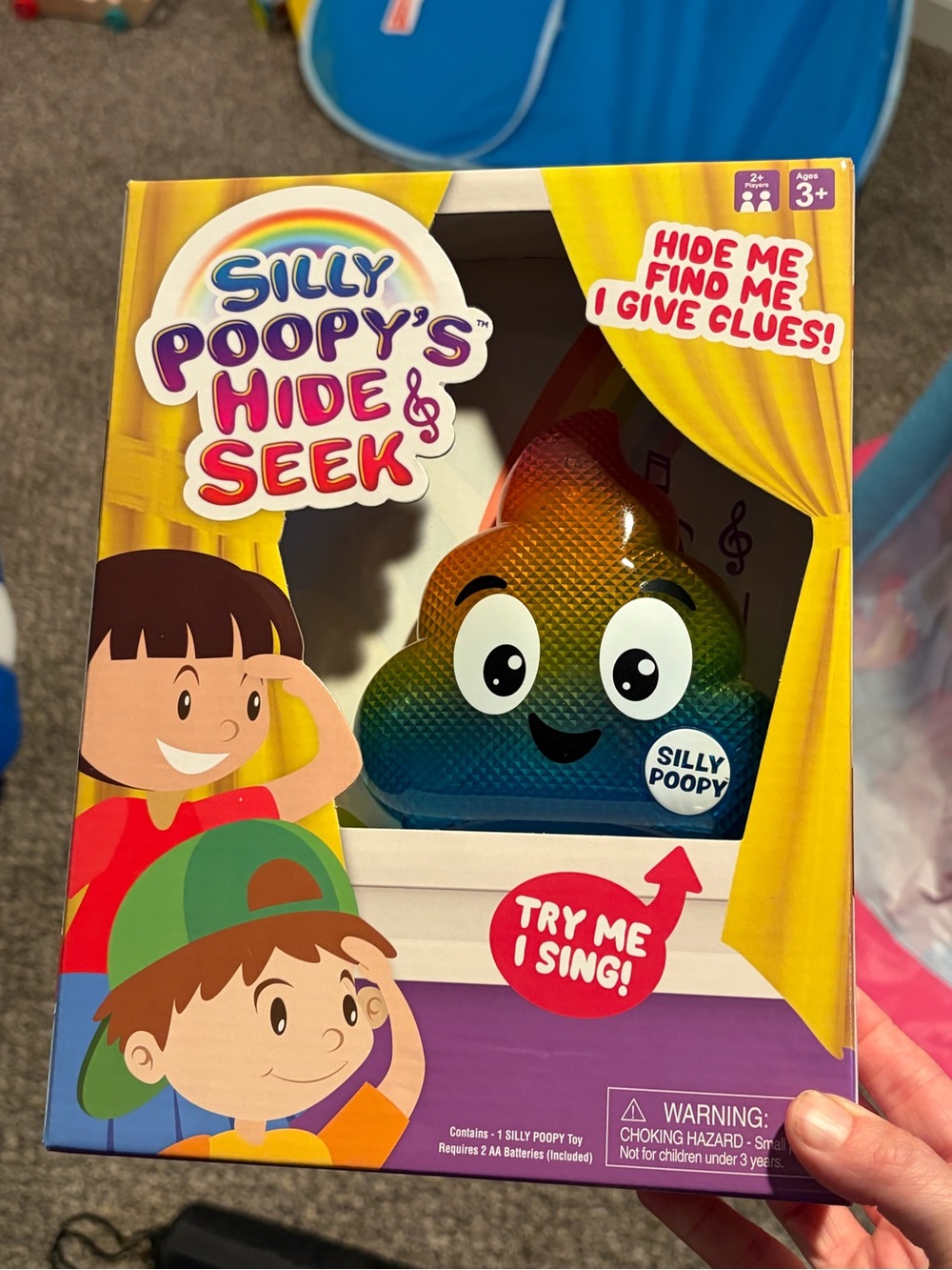 Silly Poopy’s Hide & Seek Singing Toy - Rainbow